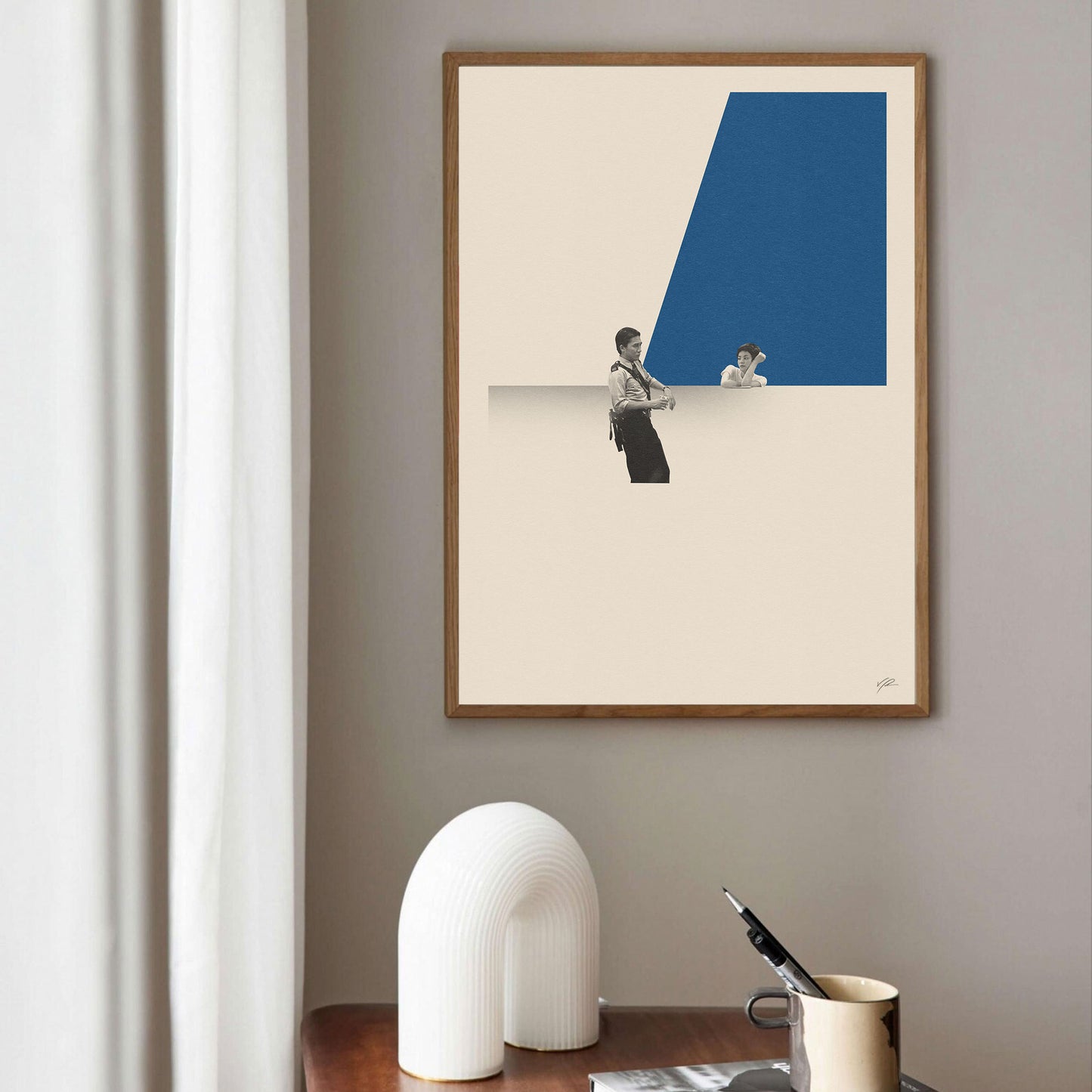 A framed poster of Faye Wong looking at Tony Leung in Wong Kar Wai's movie Chungking Express