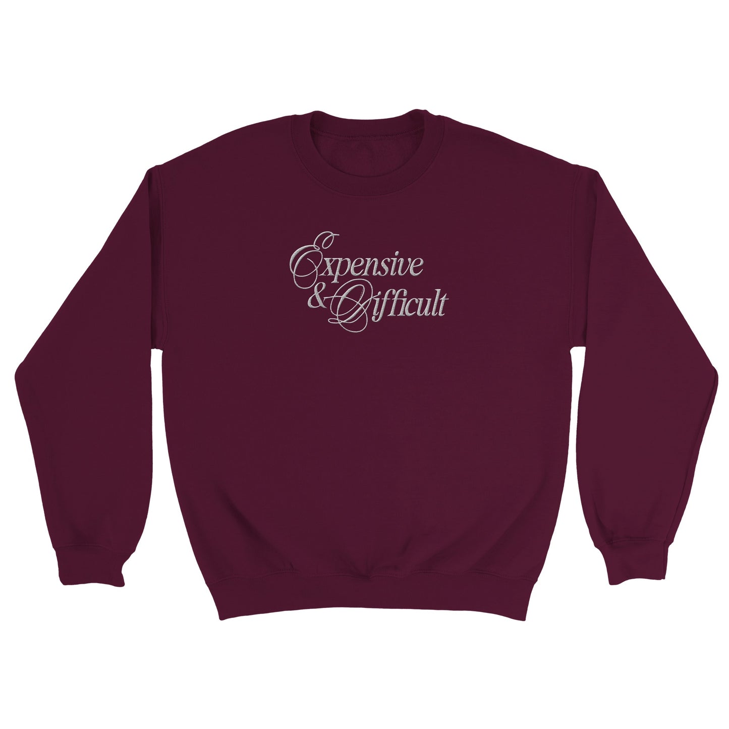 expensive and difficult embroidered on a maroon sweatshirt