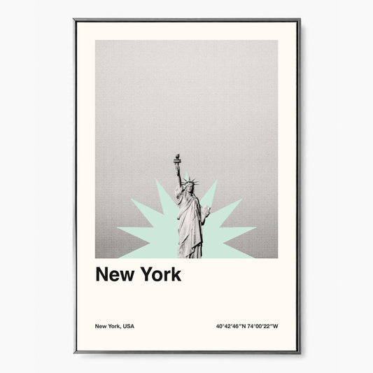 A framed poster of the Statue of Liberty and coordinates of new york city