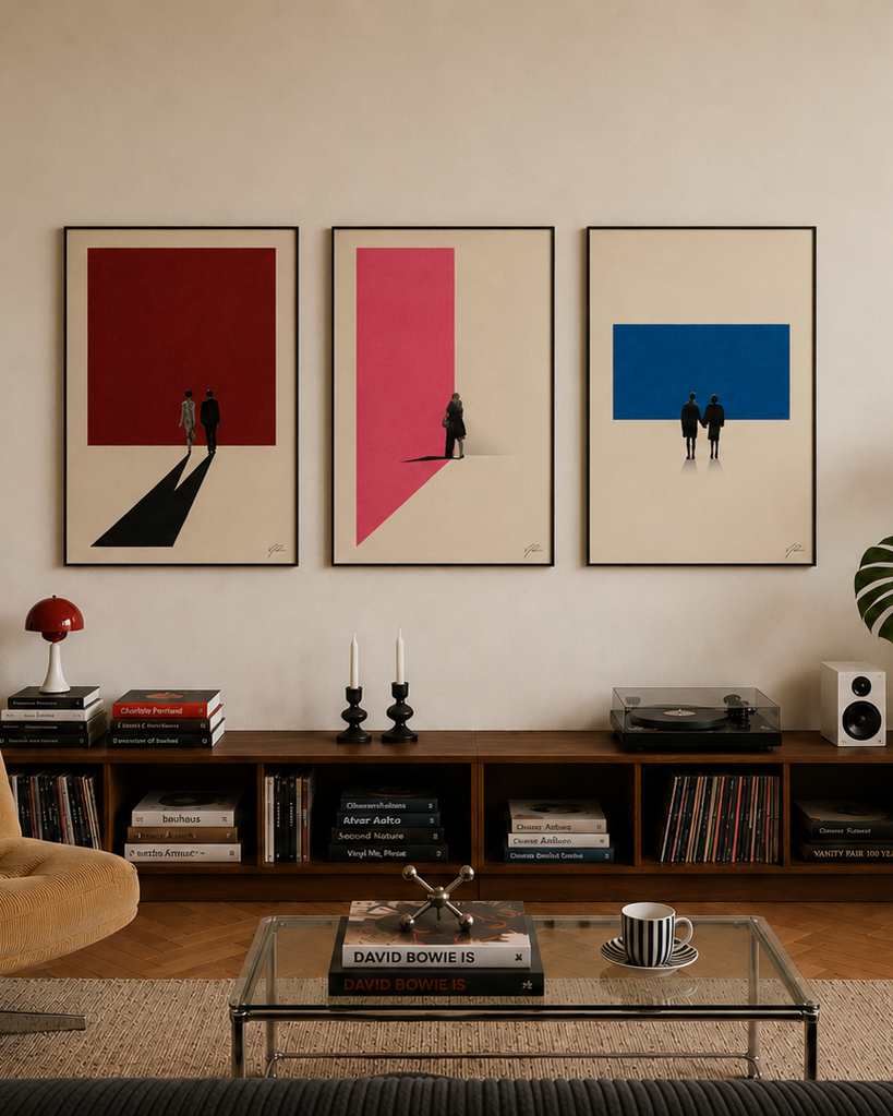 Modern living room with a brown armchair, coffee table, and wall art.